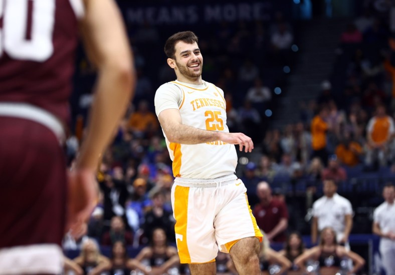 Mar 13, 2022; Tampa, FL, USA; Tennessee Volunteers guard Santiago Vescovi (25) smiles after making a three point basket against the Texas A&M Aggies during the second half at Amalie Arena. Mandatory Credit: Kim Klement-USA TODAY Sports