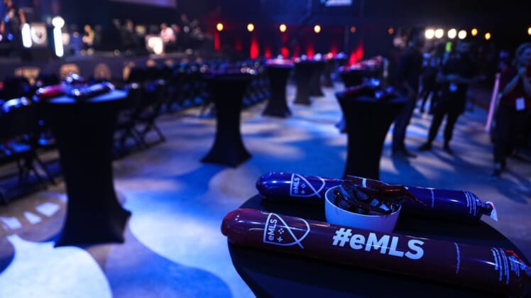 Thunder sticks are placed on chairs and tables for fans. The eMLS Cup tournament was held in-person at the Moody Theater on March 13, 2022. The eMLS Cup is the championship tournament that determines which player is the best FIFA player in North America.Aem Sxsw Emls Cup 2