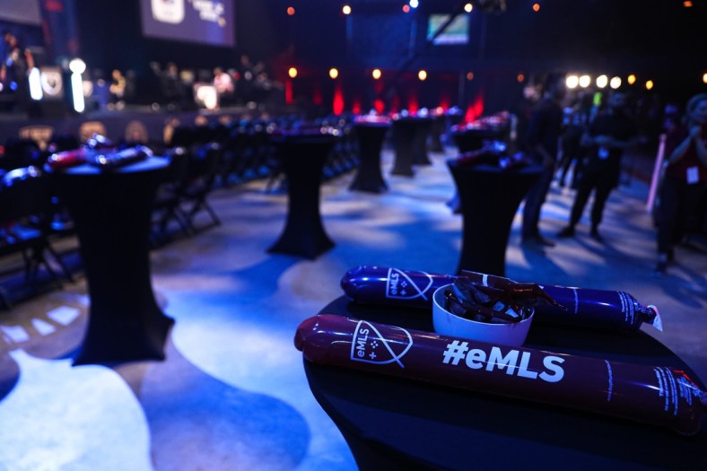 Thunder sticks are placed on chairs and tables for fans. The eMLS Cup tournament was held in-person at the Moody Theater on March 13, 2022. The eMLS Cup is the championship tournament that determines which player is the best FIFA player in North America.

Aem Sxsw Emls Cup 2