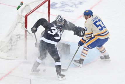 Mar 13, 2022; Hamilton, Ontario, CAN;  Toronto Maple Leafs goalie Petr Mrazek (35) makes a save on a shot from Buffalo Sabres forward Jeff Skinner (53) as defenseman Timothy Liljegren (37) looks to clear the rebound in the 2022 Heritage Classic ice hockey game at Tim Hortons Field. Mandatory Credit: Dan Hamilton-USA TODAY Sports