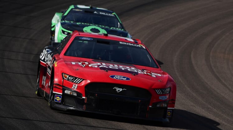 Mar 13, 2022; Avondale, Arizona, USA; NASCAR Cup Series driver Chase Briscoe (14) drives ahead of driver Austin Dillon (3) during the Ruoff Mortgage 500 at Phoenix Raceway. Mandatory Credit: Gary A. Vasquez-USA TODAY Sports