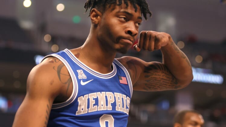 Memphis Tigers guard Earl Timberlake flexes to celebrate making a shot while being fouled against the Houston Cougars during their AAC Tournament Championship at Dickies Arena in Fort Worth, TX on Sunday, March 13, 2022.Jrca9665
