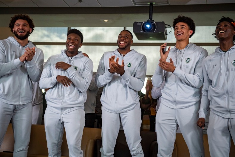 Colorado State men's basketball players David Roddy, left, Isaiah Stevens, Chandler Jacobs, Jalen Lake and Kendle Moore react after the Rams earned a No. 6 seed during an NCAA Tournament Selection Sunday watch party at Canvas Stadium in Fort Collins on Sunday, March 13, 2022.

Ftc 0312 Csu Selection Show 002