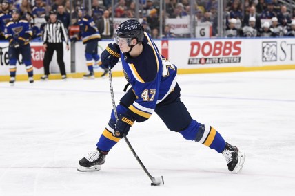 Mar 13, 2022; St. Louis, Missouri, USA; St. Louis Blues defenseman Torey Krug (47) takes a shot against the Winnipeg Jets during the second period at Enterprise Center. Mandatory Credit: Jeff Le-USA TODAY Sports