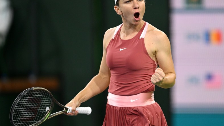 Mar 13, 2022; Indian Wells, CA, USA;  Simona Halep (ROU) celebrates after defeating Coco Gauff (USA) in her third round match at the BNP Paribas Open at the Indian Wells Tennis Garden. Mandatory Credit: Jayne Kamin-Oncea-USA TODAY Sports