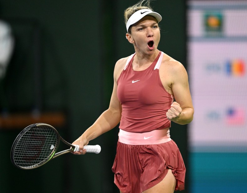 Mar 13, 2022; Indian Wells, CA, USA;  Simona Halep (ROU) celebrates after defeating Coco Gauff (USA) in her third round match at the BNP Paribas Open at the Indian Wells Tennis Garden. Mandatory Credit: Jayne Kamin-Oncea-USA TODAY Sports