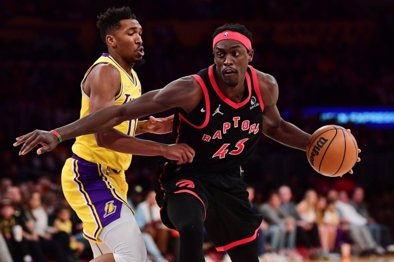 Mar 14, 2022; Los Angeles, California, USA; Toronto Raptors forward Pascal Siakam (43) moves to the basket against Los Angeles Lakers guard Malik Monk (11) during the first half at Crypto.com Arena. Mandatory Credit: Gary A. Vasquez-USA TODAY Sports