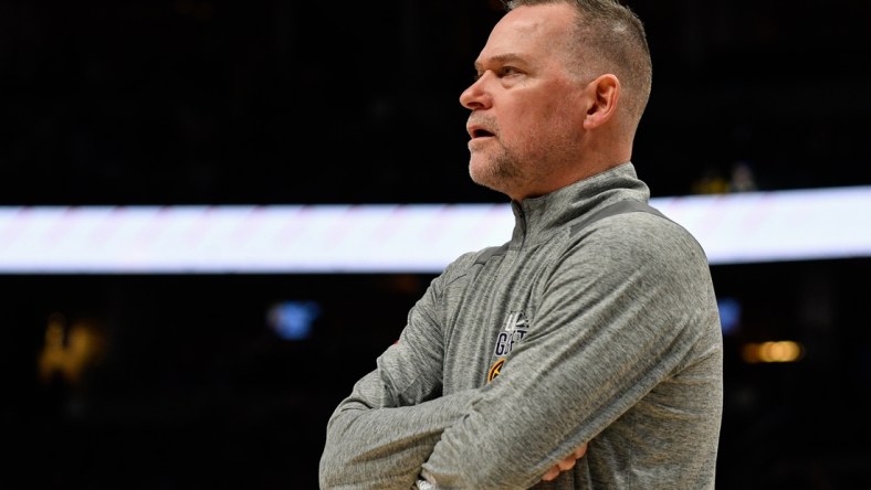Mar 12, 2022; Denver, Colorado, USA; Denver Nuggets head coach Michael Malone during a timeout against the Toronto Raptors at Ball Arena. Mandatory Credit: John Leyba-USA TODAY Sports