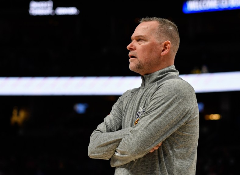 Mar 12, 2022; Denver, Colorado, USA; Denver Nuggets head coach Michael Malone during a timeout against the Toronto Raptors at Ball Arena. Mandatory Credit: John Leyba-USA TODAY Sports