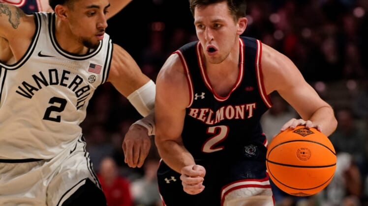 Belmont guard Grayson Murphy (2) drives past Vanderbilt guard Scotty Pippen Jr. (2) during the first half of a first round NIT basketball game at Memorial Gymnasium Tuesday, March 15, 2022 in Nashville, Tenn.Nas Vandy Belmont Nit 013