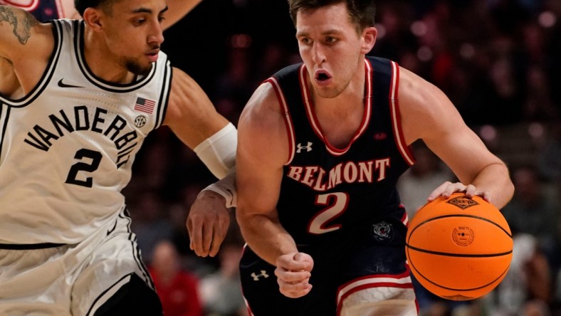 Belmont guard Grayson Murphy (2) drives past Vanderbilt guard Scotty Pippen Jr. (2) during the first half of a first round NIT basketball game at Memorial Gymnasium Tuesday, March 15, 2022 in Nashville, Tenn.

Nas Vandy Belmont Nit 013