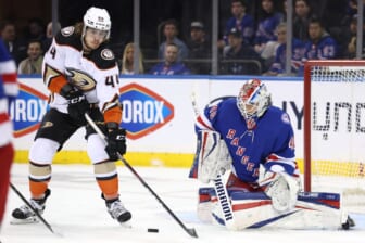 Mar 15, 2022; New York, New York, USA; Anaheim Ducks left wing Max Comtois (44) plays the puck in front of New York Rangers goaltender Alexandar Georgiev (40) during the second period at Madison Square Garden. Mandatory Credit: Brad Penner-USA TODAY Sports