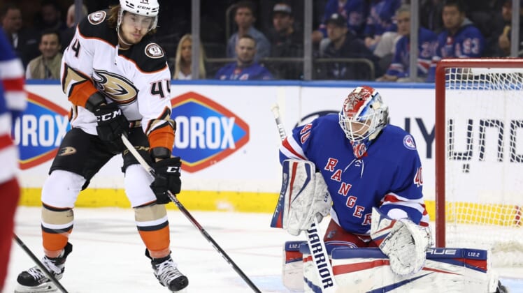 Mar 15, 2022; New York, New York, USA; Anaheim Ducks left wing Max Comtois (44) plays the puck in front of New York Rangers goaltender Alexandar Georgiev (40) during the second period at Madison Square Garden. Mandatory Credit: Brad Penner-USA TODAY Sports