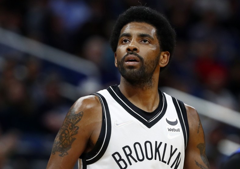 Mar 15, 2022; Orlando, Florida, USA; Brooklyn Nets guard Kyrie Irving (11) during the second half against the Orlando Magic at Amway Center. Mandatory Credit: Kim Klement-USA TODAY Sports