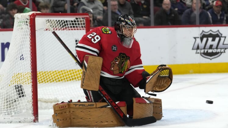 Mar 15, 2022; Chicago, Illinois, USA; Chicago Blackhawks goaltender Marc-Andre Fleury (29) makes a save against the Boston Bruins during the second period at the United Center. Mandatory Credit: Mike Dinovo-USA TODAY Sports