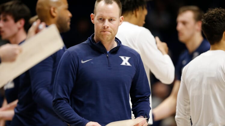 Xavier Musketeers head coach Travis Steele walks into a huddle in the first half of the NIT First Round game between the Xavier Musketeers and the Cleveland State Vikings at the Cintas Center in Cincinnati on Tuesday, March 15, 2022.Cleveland State Vikings At Xavier Musketeers Nit