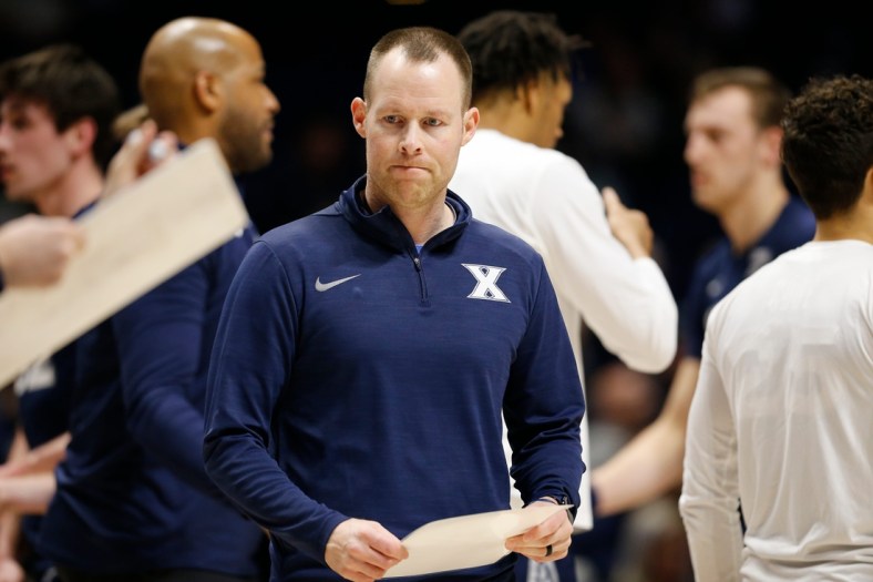 Xavier Musketeers head coach Travis Steele walks into a huddle in the first half of the NIT First Round game between the Xavier Musketeers and the Cleveland State Vikings at the Cintas Center in Cincinnati on Tuesday, March 15, 2022.

Cleveland State Vikings At Xavier Musketeers Nit