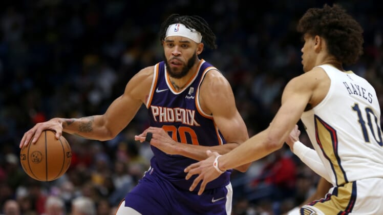 Mar 15, 2022; New Orleans, Louisiana, USA; Phoenix Suns center JaVale McGee (00) is defended by New Orleans Pelicans center Jaxson Hayes (10) in the second half at the Smoothie King Center. Mandatory Credit: Chuck Cook-USA TODAY Sports