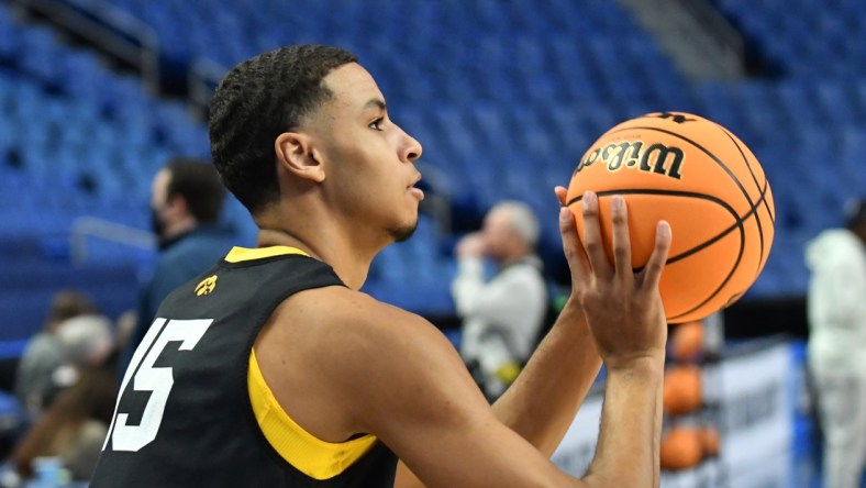 Mar 16, 2022; Buffalo, NY, USA; Iowa Hawkeyes forward Keegan Murray (15) shoots the ball during a practice session prior to the first round of the 2022 NCAA Tournament at KeyBank Center. Mandatory Credit: Mark Konezny-USA TODAY Sports