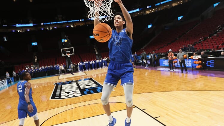 Memphis Tigers forward Josh Minott dunks the ball during an open practice at the Moda Center in Portland, Ore. on Wednesday, March 16, 2022.Jrca1379