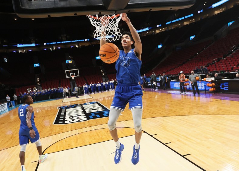 Memphis Tigers forward Josh Minott dunks the ball during an open practice at the Moda Center in Portland, Ore. on Wednesday, March 16, 2022.

Jrca1379