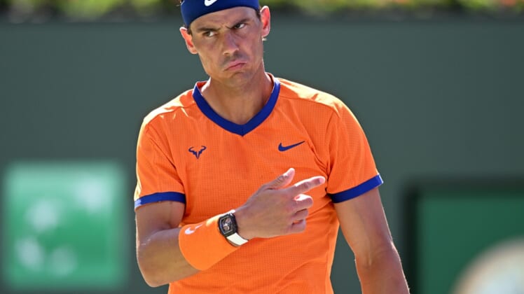 Mar 16, 2022; Indian Wells, CA, USA;  Rafael Nadal (ESP) questions a line call during his fourth round match against Reilly Opelka (USA) in the fourth round at the BNP Paribas Open at the Indian Wells Tennis Garden. Mandatory Credit: Jayne Kamin-Oncea-USA TODAY Sports