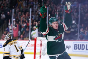 Mar 16, 2022; Saint Paul, Minnesota, USA; Minnesota Wild left wing Kirill Kaprizov (97) reacts after scoring a goal against the Boston Bruins during the first period at Xcel Energy Center. Mandatory Credit: Harrison Barden-USA TODAY Sports