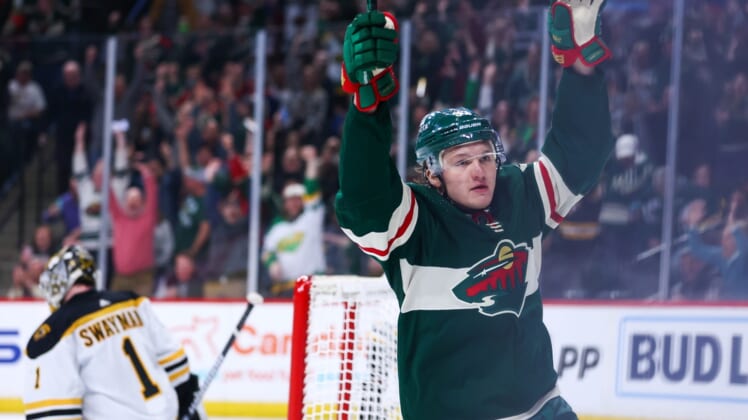Mar 16, 2022; Saint Paul, Minnesota, USA; Minnesota Wild left wing Kirill Kaprizov (97) reacts after scoring a goal against the Boston Bruins during the first period at Xcel Energy Center. Mandatory Credit: Harrison Barden-USA TODAY Sports