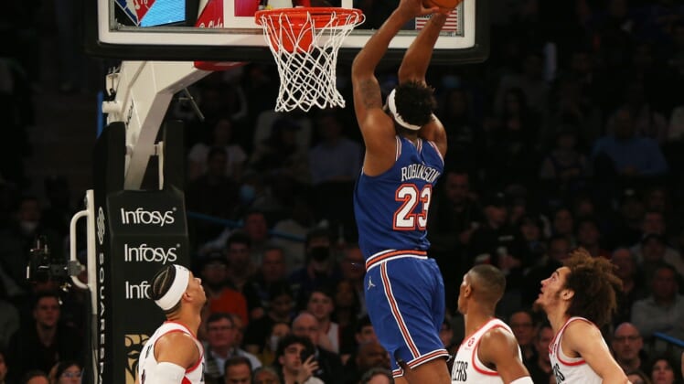 Mar 16, 2022; New York, New York, USA; New York Knicks center Mitchell Robinson (23) goes up for a dunk against the Portland Trail Blazers during the first half at Madison Square Garden. Mandatory Credit: Andy Marlin-USA TODAY Sports
