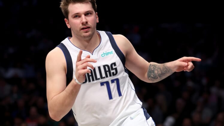 Mar 16, 2022; Brooklyn, New York, USA; Dallas Mavericks guard Luka Doncic (77) reacts during the second quarter against the Brooklyn Nets at Barclays Center. Mandatory Credit: Brad Penner-USA TODAY Sports