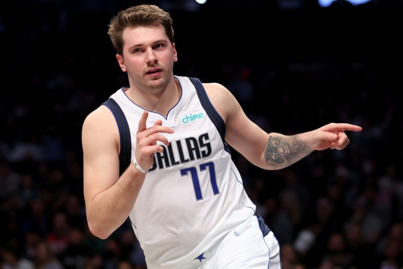 Mar 16, 2022; Brooklyn, New York, USA; Dallas Mavericks guard Luka Doncic (77) reacts during the second quarter against the Brooklyn Nets at Barclays Center. Mandatory Credit: Brad Penner-USA TODAY Sports