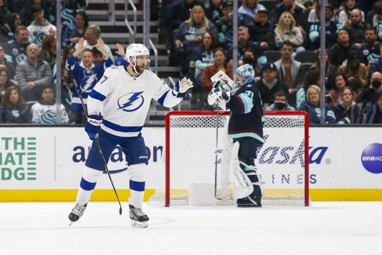 Mar 16, 2022; Seattle, Washington, USA; Tampa Bay Lightning defenseman Victor Hedman (77) celebrates after scoring a power play goal against the Seattle Kraken during the second period at Climate Pledge Arena. Mandatory Credit: Joe Nicholson-USA TODAY Sports