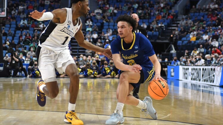 Mar 17, 2022; Buffalo, NY, USA; South Dakota State Jackrabbits guard Zeke Mayo (2) dribbles the ball against Providence Friars guard Al Durham (1) in the first half during the first round of the 2022 NCAA Tournament at KeyBank Center. Mandatory Credit: Mark Konezny-USA TODAY Sports