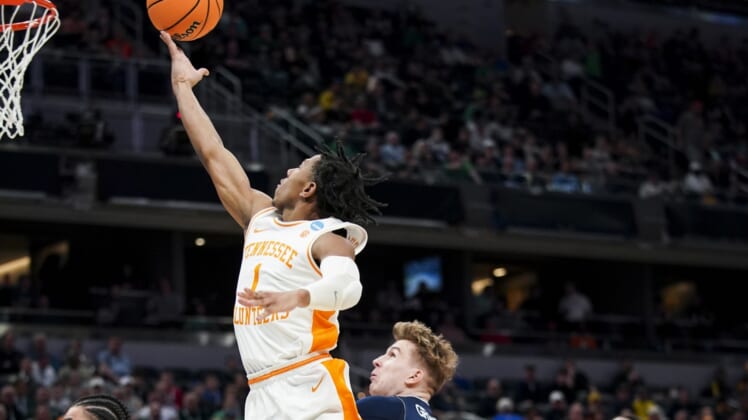 Mar 17, 2022; Indianapolis, IN, USA; Tennessee Volunteers guard Kennedy Chandler (1) drives to the basket against Longwood Lancers forward Jesper Granlund (35) in the first half during the first round of the 2022 NCAA Tournament at Gainbridge Fieldhouse. Mandatory Credit: Robert Goddin-USA TODAY Sports