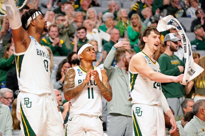 Mar 17, 2022; Fort Worth, TX, USA; Baylor Bears forward Flo Thamba (0) and guard James Akinjo (11) and guard Matthew Mayer (24) reacts after a play against the Norfolk State Spartans during the second half during the first round of the 2022 NCAA Tournament at Dickies Arena. Mandatory Credit: Chris Jones-USA TODAY Sports