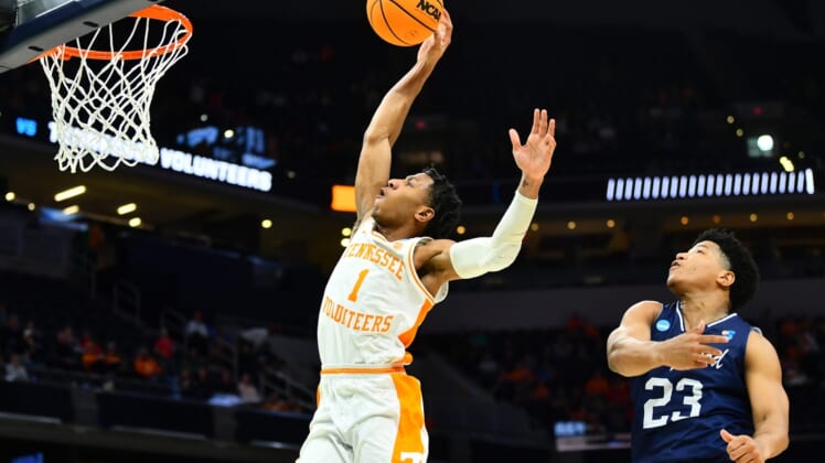 Tennessee guard Kennedy Chandler (1) takes a shot while defended by Longwood guard DA Houston (23) during the NCAA Tournament first round game between Tennessee and Longwood at Gainbridge Fieldhouse in Indianapolis, Ind., on Thursday, March 17, 2022.Kns Ncaa Vols Longwood Bp