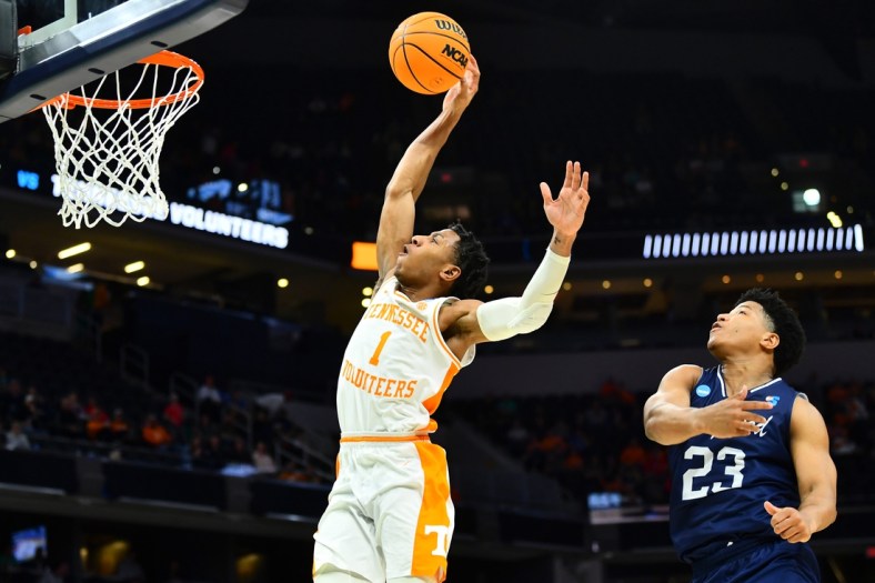 Tennessee guard Kennedy Chandler (1) takes a shot while defended by Longwood guard DA Houston (23) during the NCAA Tournament first round game between Tennessee and Longwood at Gainbridge Fieldhouse in Indianapolis, Ind., on Thursday, March 17, 2022.

Kns Ncaa Vols Longwood Bp