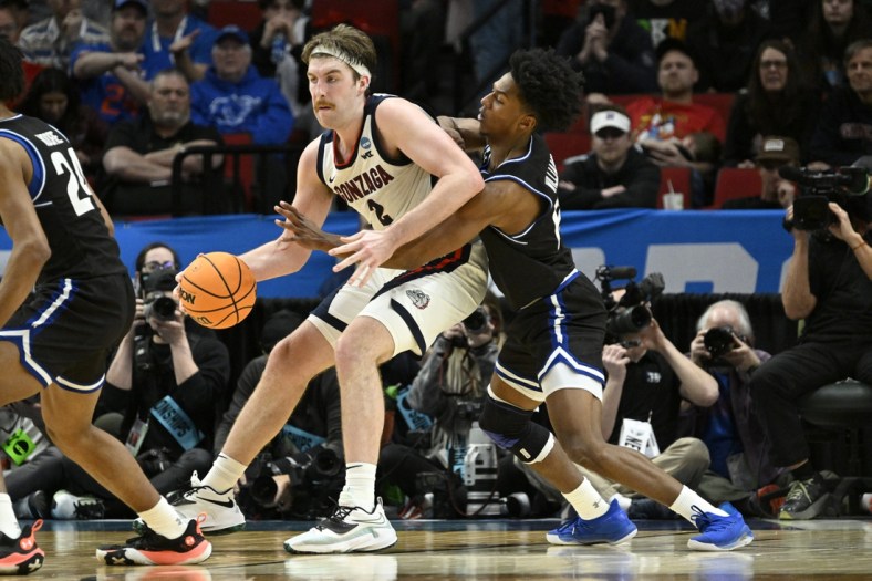 Mar 17, 2022; Portland, OR, USA; Georgia State Panthers guard Kane Williams (12) defend against Gonzaga Bulldogs forward Drew Timme (2) in the second half during the first round of the 2022 NCAA Tournament at Moda Center. Mandatory Credit: Troy Wayrynen-USA TODAY Sports