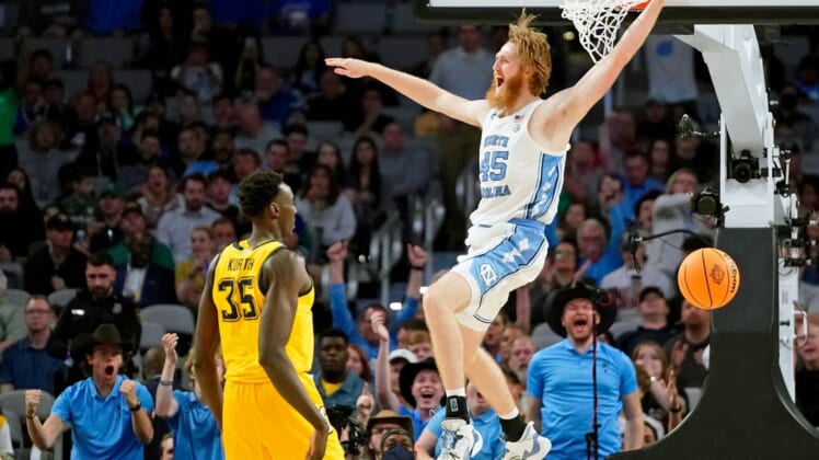 Mar 17, 2022; Fort Worth, TX, USA; North Carolina Tar Heels forward Brady Manek (45) reacts after dunking against the Marquette Golden Eagles during the second half during the first round of the 2022 NCAA Tournament at Dickies Arena. Mandatory Credit: Chris Jones-USA TODAY Sports