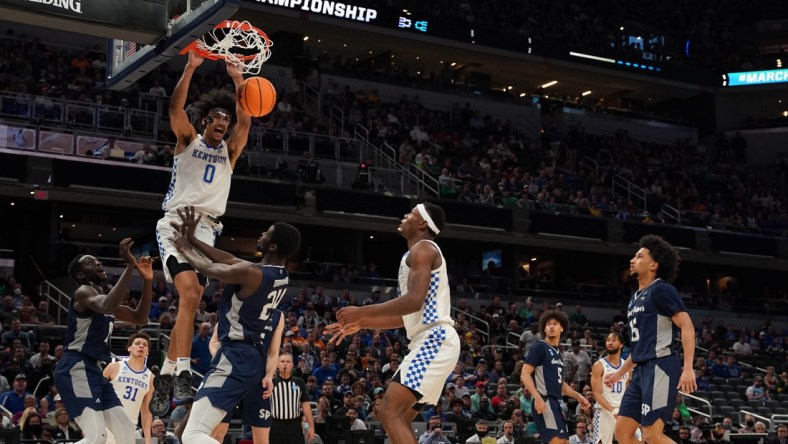 Mar 17, 2022; Indianapolis, IN, USA; Kentucky Wildcats forward Jacob Toppin (0) dunks the ball on the Saint Peter's Peacocks during the first round of the 2022 NCAA Tournament at Gainbridge Fieldhouse. Mandatory Credit: Robert Goddin-USA TODAY Sports