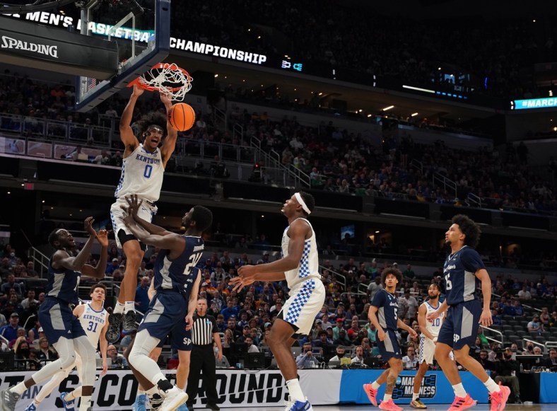 Mar 17, 2022; Indianapolis, IN, USA; Kentucky Wildcats forward Jacob Toppin (0) dunks the ball on the Saint Peter's Peacocks during the first round of the 2022 NCAA Tournament at Gainbridge Fieldhouse. Mandatory Credit: Robert Goddin-USA TODAY Sports
