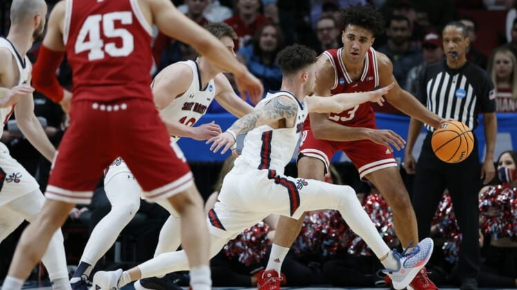 Mar 17, 2022; Portland, OR, USA; Indiana Hoosiers forward Trayce Jackson-Davis (23) is defended by Saint Mary's Gaels guard Logan Johnson (0) during the first half during the first round of the 2022 NCAA Tournament at Moda Center. Mandatory Credit: Soobum Im-USA TODAY Sports