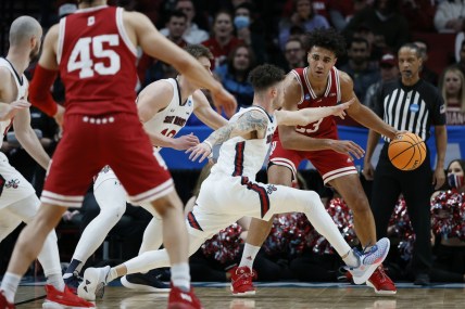 Mar 17, 2022; Portland, OR, USA; Indiana Hoosiers forward Trayce Jackson-Davis (23) is defended by Saint Mary's Gaels guard Logan Johnson (0) during the first half during the first round of the 2022 NCAA Tournament at Moda Center. Mandatory Credit: Soobum Im-USA TODAY Sports