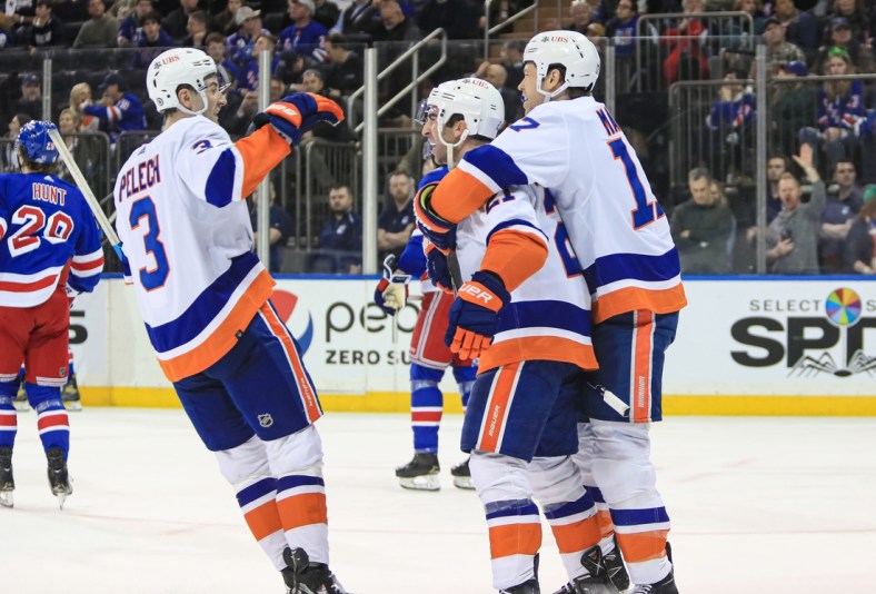 Mar 17, 2022; New York, New York, USA; New York Islanders right wing Kyle Palmieri (21) celebrates his go ahead goal against the New York Rangers during the third period at Madison Square Garden. Mandatory Credit: Danny Wild-USA TODAY Sports