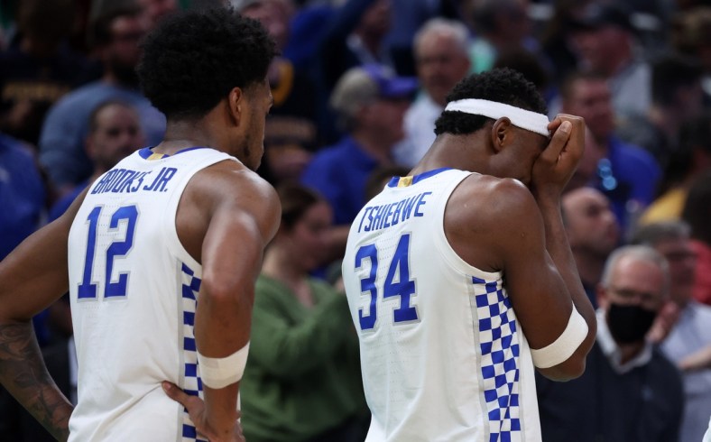 Mar 17, 2022; Indianapolis, IN, USA; Kentucky Wildcats forward Oscar Tshiebwe (34) reacts after losing to the Saint Peter's Peacocks during the first round of the 2022 NCAA Tournament at Gainbridge Fieldhouse. Mandatory Credit: Trevor Ruszkowski-USA TODAY Sports