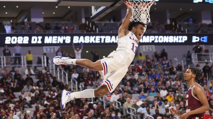 Mar 17, 2022; Fort Worth, TX, USA; Kansas Jayhawks guard Remy Martin (11) dunks the ball against the Texas Southern Tigers during the first half in the first round of the 2022 NCAA Tournament at Dickies Arena. Mandatory Credit: Kevin Jairaj-USA TODAY Sports
