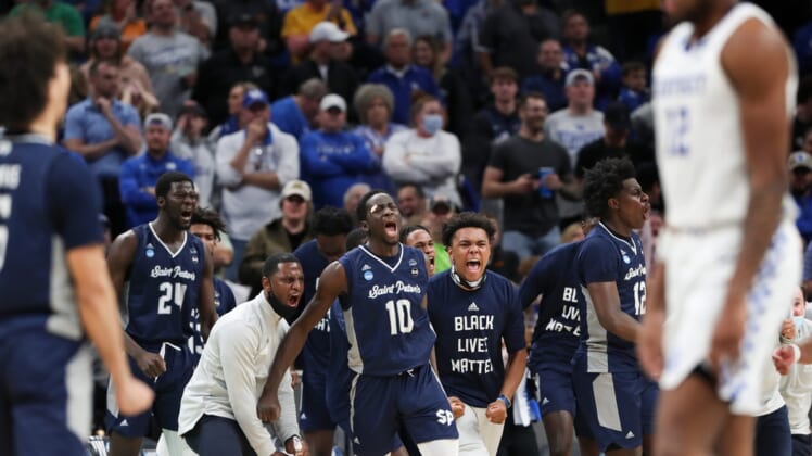 Saint Peter's celebrated a late score against UK during their first round NCAA Tournament game at the Gainbridge Fieldhouse in Indianapolis, In. on Mar. 17, 2022.  Saint Peter's won 85-79 in OT.Uk Saints25 Sam