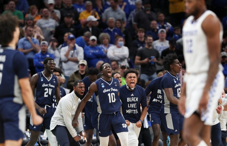 Saint Peter's celebrated a late score against UK during their first round NCAA Tournament game at the Gainbridge Fieldhouse in Indianapolis, In. on Mar. 17, 2022.  Saint Peter's won 85-79 in OT.

Uk Saints25 Sam