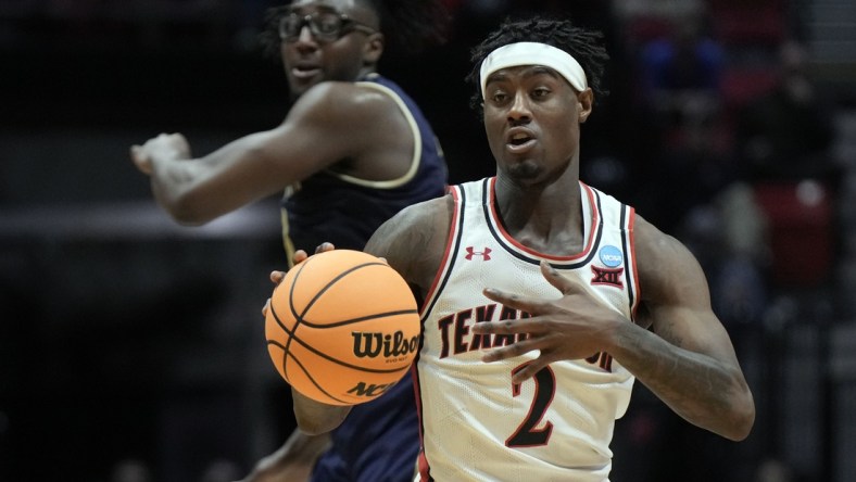 Mar 18, 2022; San Diego, CA, USA; Texas Tech Red Raiders guard Davion Warren (2) controls the ball against the Montana State Bobcats in the first half during the first round of the 2022 NCAA Tournament at Viejas Arena. Mandatory Credit: Kirby Lee-USA TODAY Sports