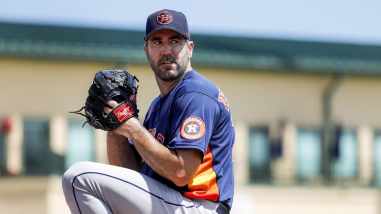 Mar 18, 2022; Jupiter, Florida, USA; Houston Astros starting pitcher Justin Verlander (35) delivers a pitch from the bullpen prior to the game against the St. Louis Cardinals during spring training at Roger Dean Stadium. Mandatory Credit: Sam Navarro-USA TODAY Sports